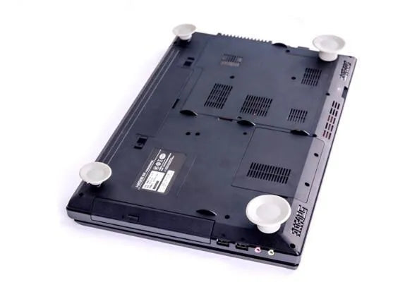 Grey plastic laptop cooling pad stand with four pieces for temperature reduction and ergonomic typing