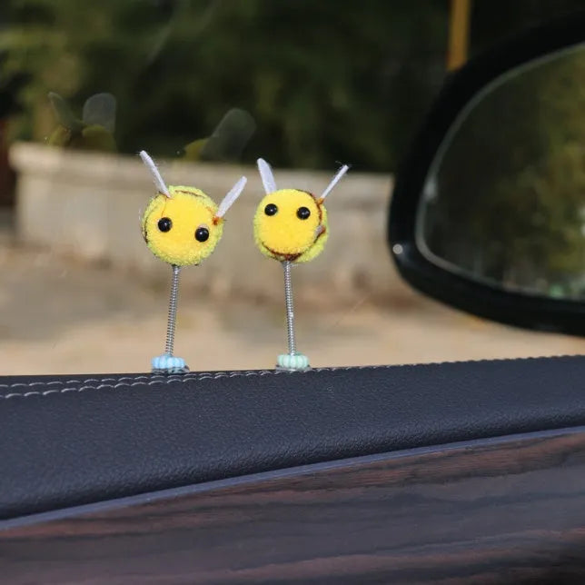 Swing spring bee car decoration made from soft fur ball material measuring 3x3cm