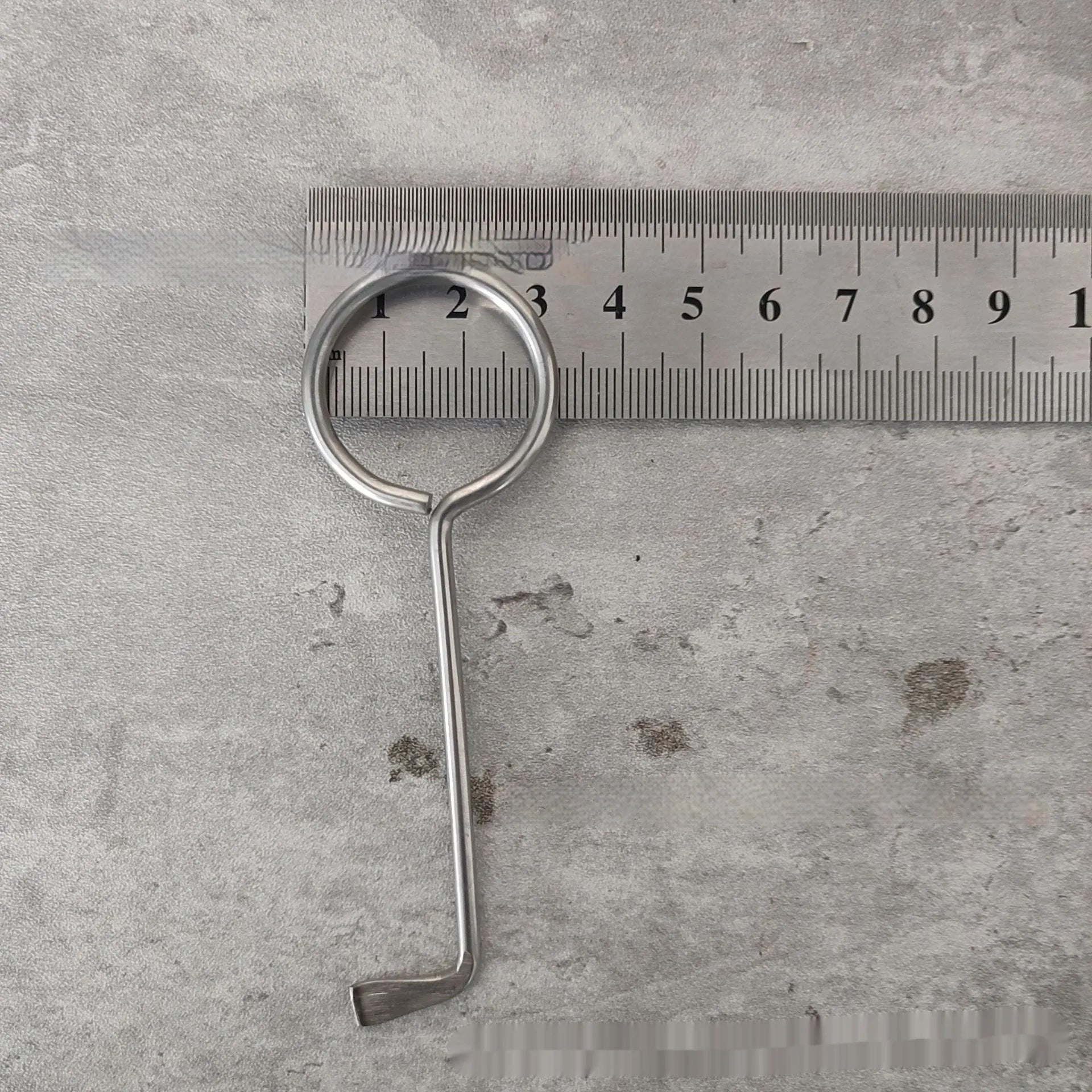 Two alloy steel wrench tools from a portable set for universal household and automotive use.
