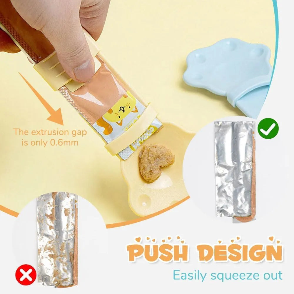Cat food feeder squeeze tool with blue cat claw shaped spoon and sliding squeezer