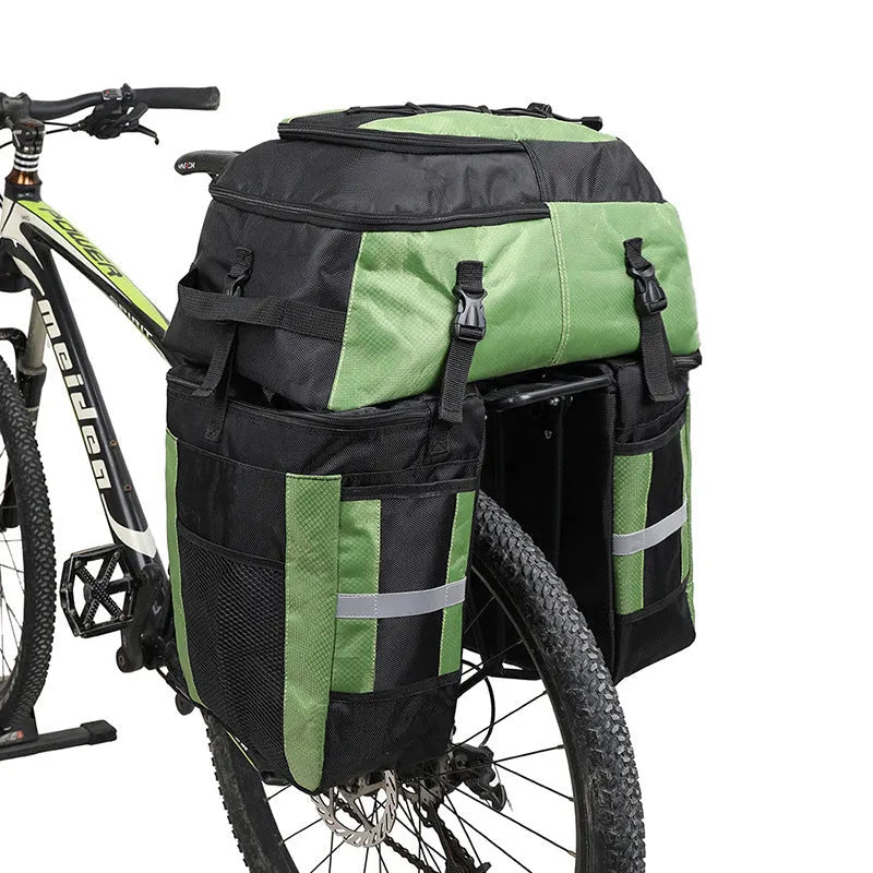 Rhinoceros bicycle rear storage bag with 70L capacity in green colour mounted on bicycle frame