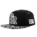 Cotton baseball cap with embroidered letters in black and white colour options