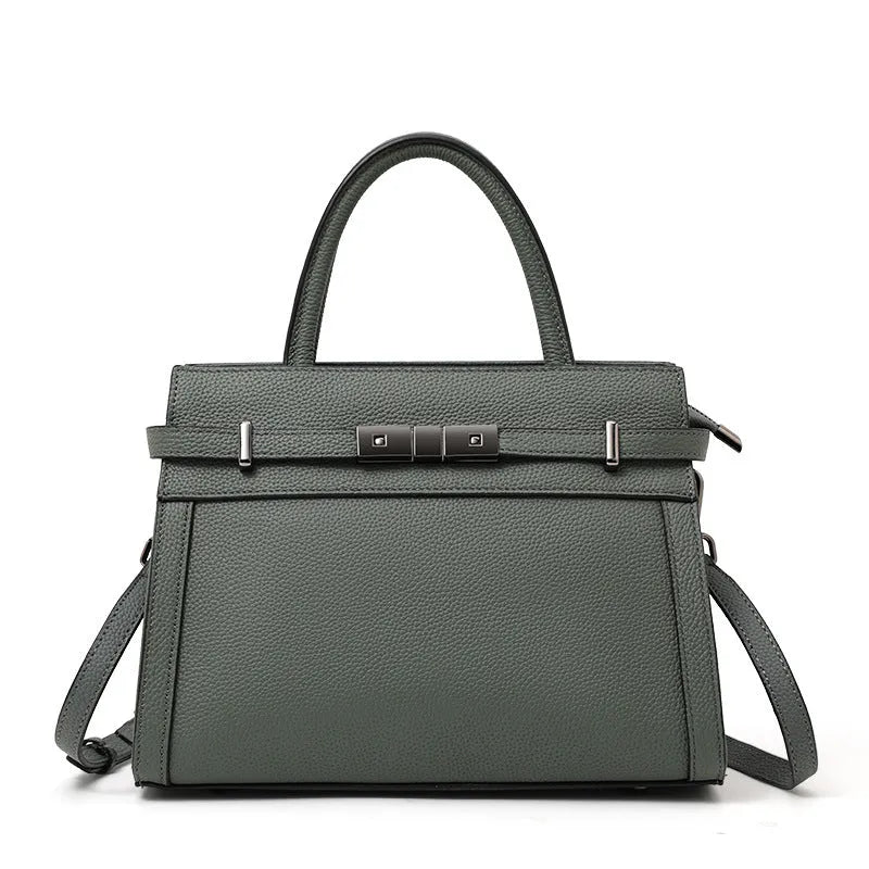 Genuine leather clamshell crossbody handbag for women with multiple internal compartments in five colour options.