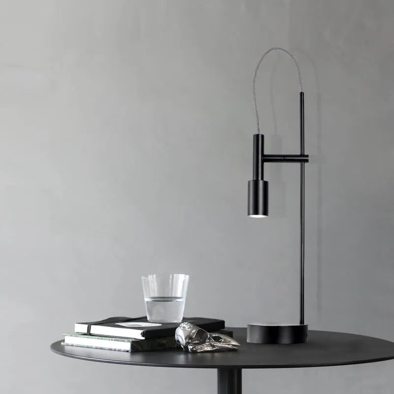 Rotating wrought iron bedside table lamp with G9 5W light source, available in sand black, sand nickel, or natural copper.