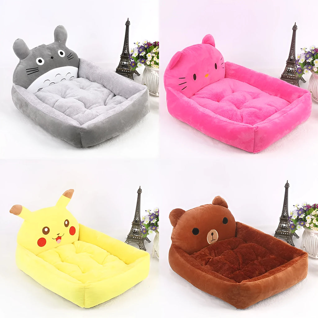 A blue cartoon-style pet sofa bed with raised sides for a small dog, showcasing its washable cover and non-slip base.