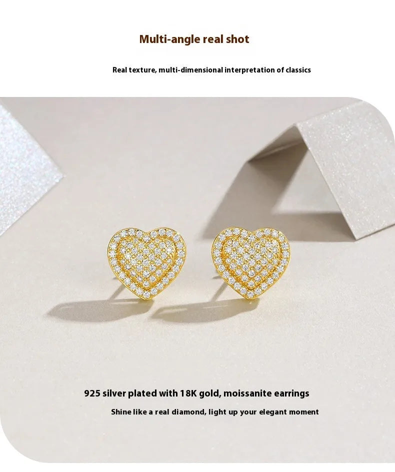 Gold-plated S925 silver stud earrings with a heart-shaped moissanite stone.