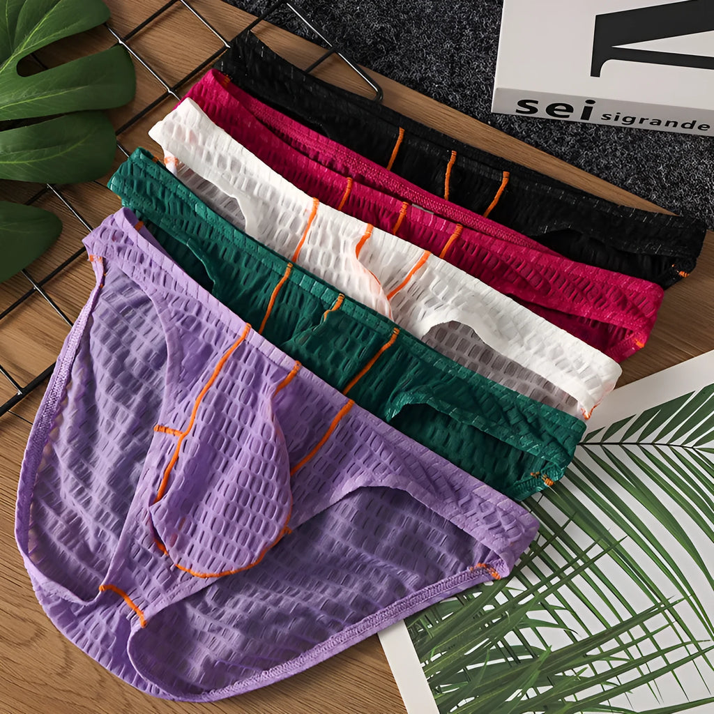 Men's low waist lace briefs in light purple on a white background