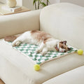 Green plaid pet blanket with soft fleece surface for cats and dogs