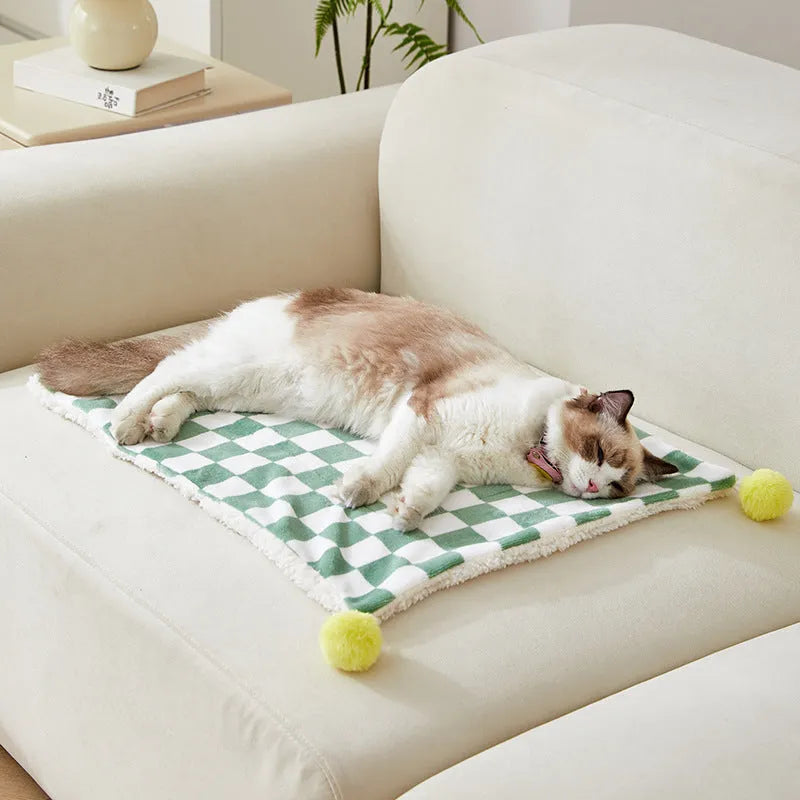 Green plaid pet blanket with soft fleece surface for cats and dogs