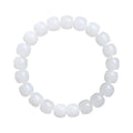White Hetian jade barrel bead bracelet on wrist, showing unisex design and elasticated band.