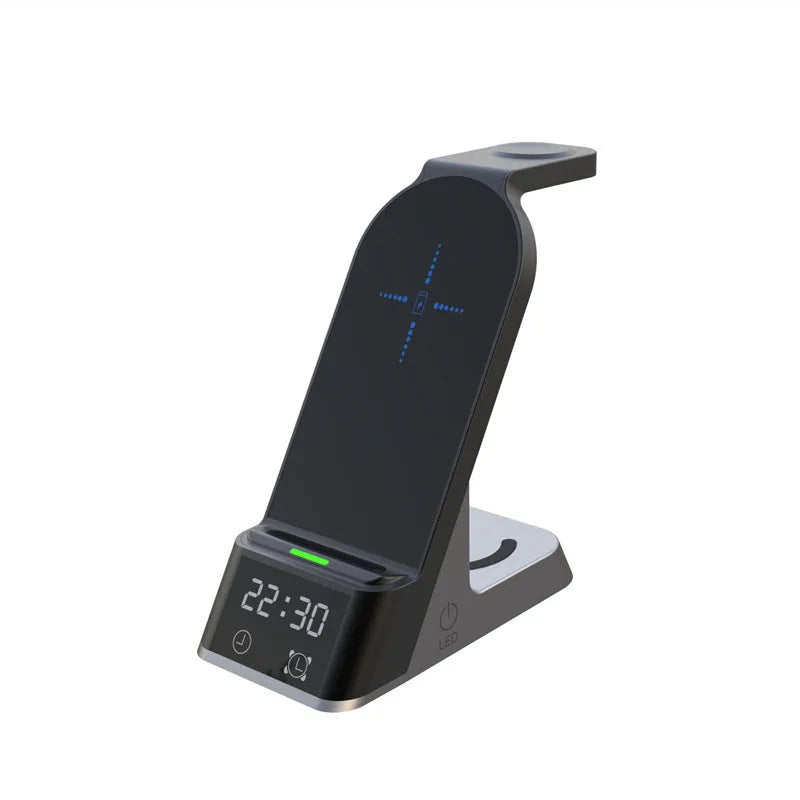 Black multifunctional alarm clock with digital display and wireless charging pad for phone, watch, and earbuds.