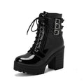 Women's thick-heeled ankle boots in black with lace-up front and round toe design