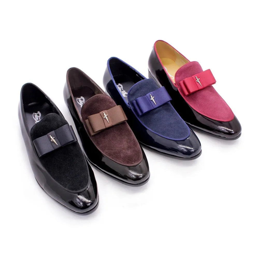 Men's glossy patent leather dress shoes with tassel detail in black, showing low-top design and leather toe holder.