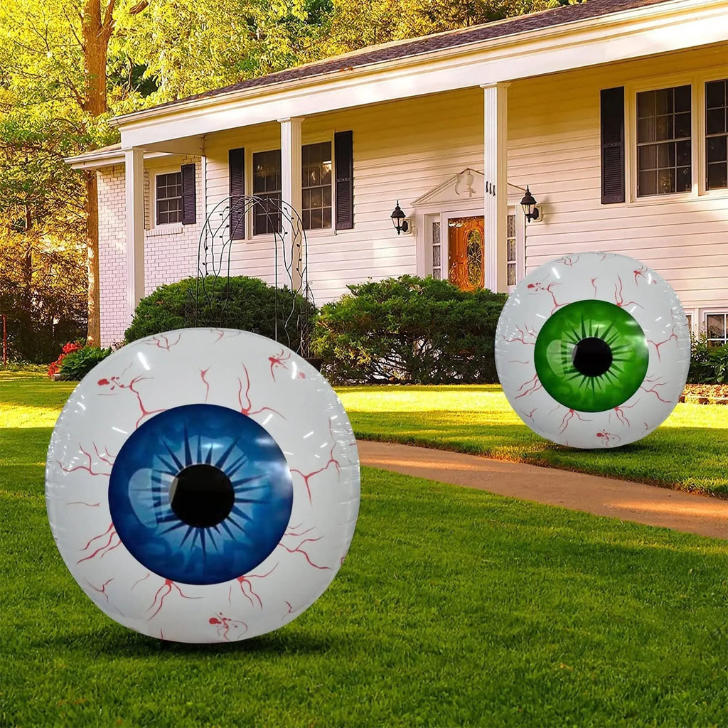 Green Halloween eyeball inflatable balloon with bloodshot pattern, shown inflated.