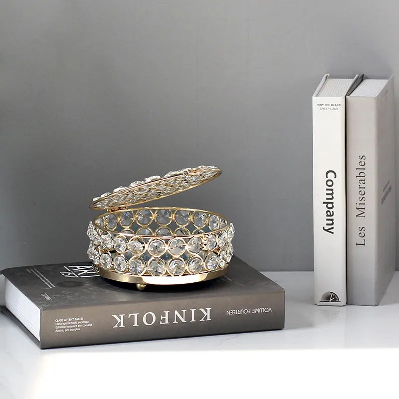 French gold European style jewelry box with crystal glass transparent lid showing contents