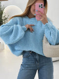 Blue round neck pullover sweater with long sleeves and loose fit, available in sizes S to XL.