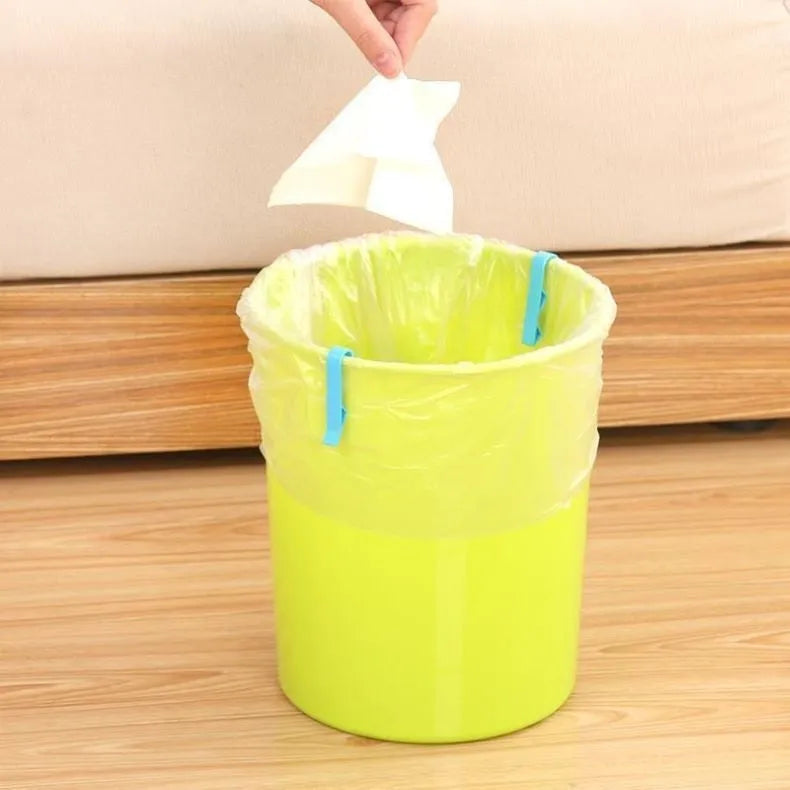 A white PP plastic non-slip fixed clip for holding bin bags to the side of a rubbish bin.