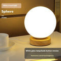Nordic style solid wood USB table lamp in a white geometric shape with touch dimming.