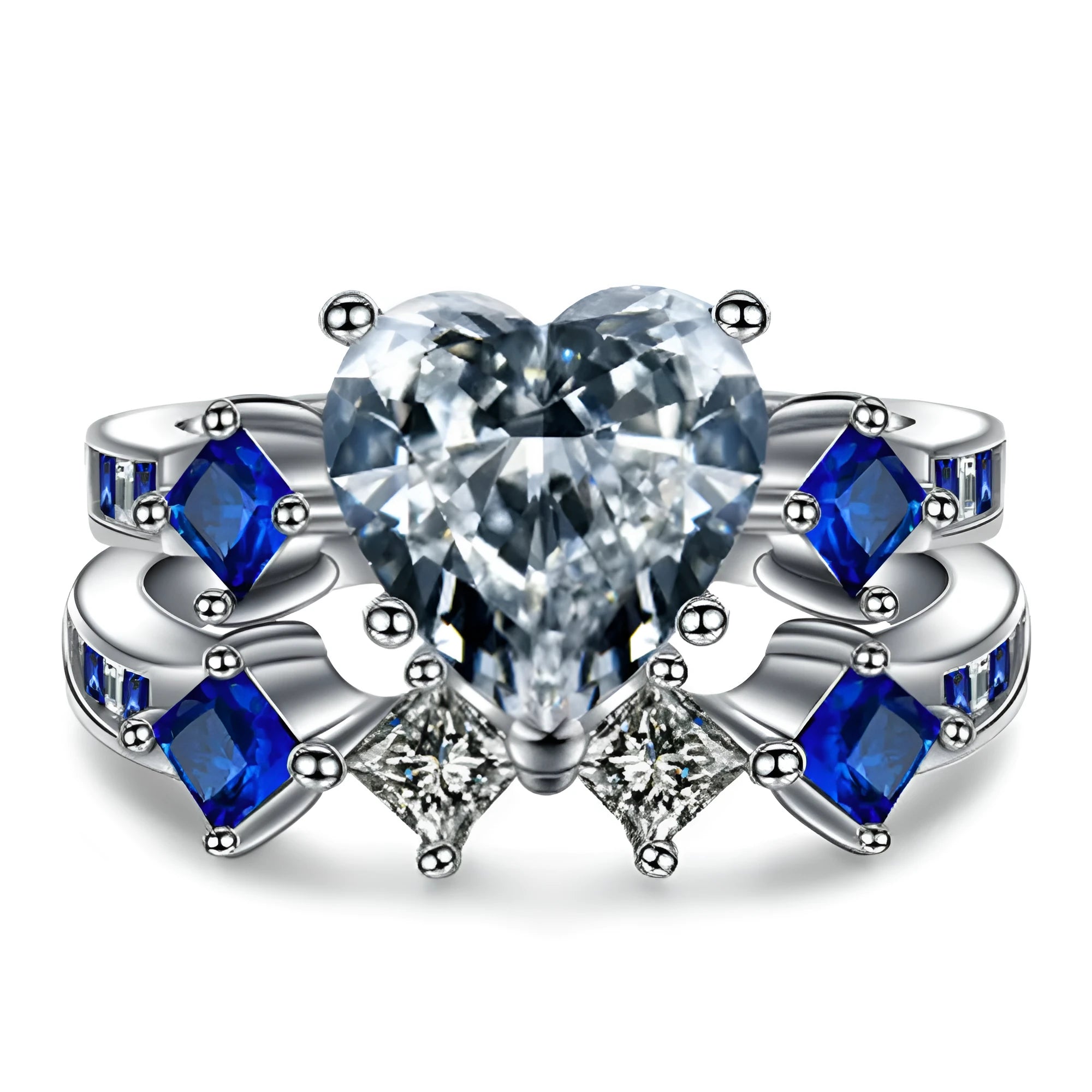 Silver-tone alloy heart-shaped geometric ring set on hand showing silver finish and multiple rings