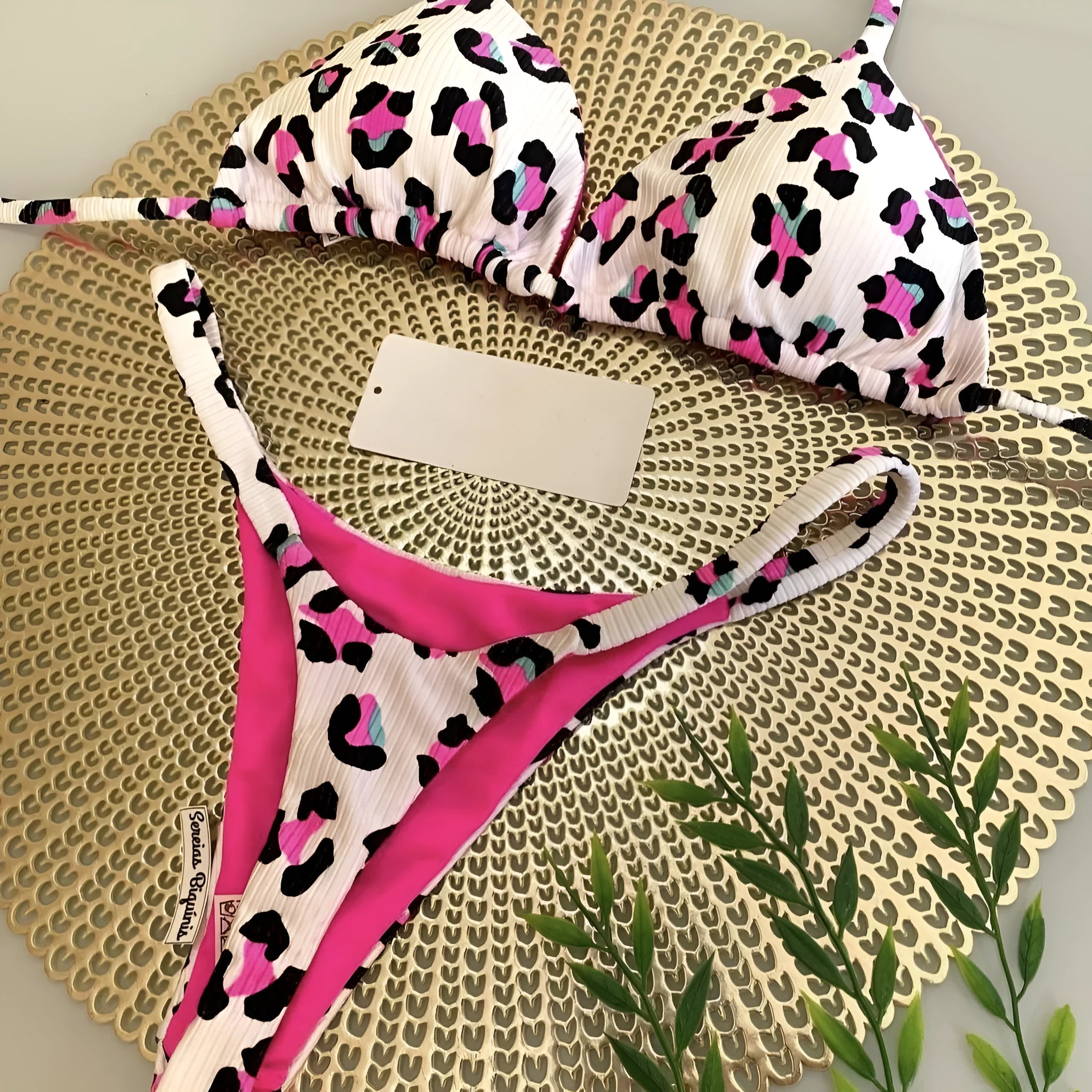 Women's blue printed bikini set with briefs, designed for swimming sports.