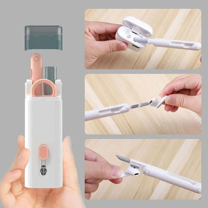 Multifunctional cleaning kit with a double-headed pen, retractable brush, and spray bottle on a white background