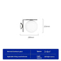 Nordic style glass wall lamp in choice of black, brass or chrome metallic finish