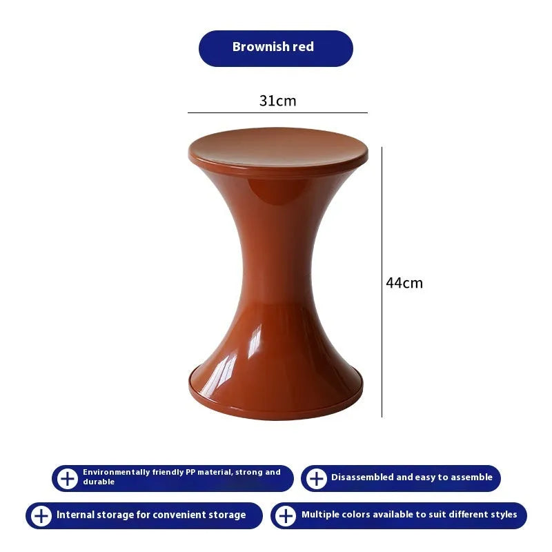 A plastic hourglass-shaped shoe changing stool in a choice of five colours.