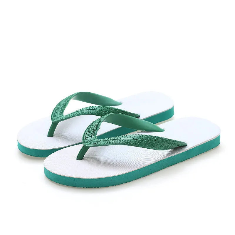 Rubber beach flip-flops with fish label in green, red, blue, or black, showing non-slip patterned sole.