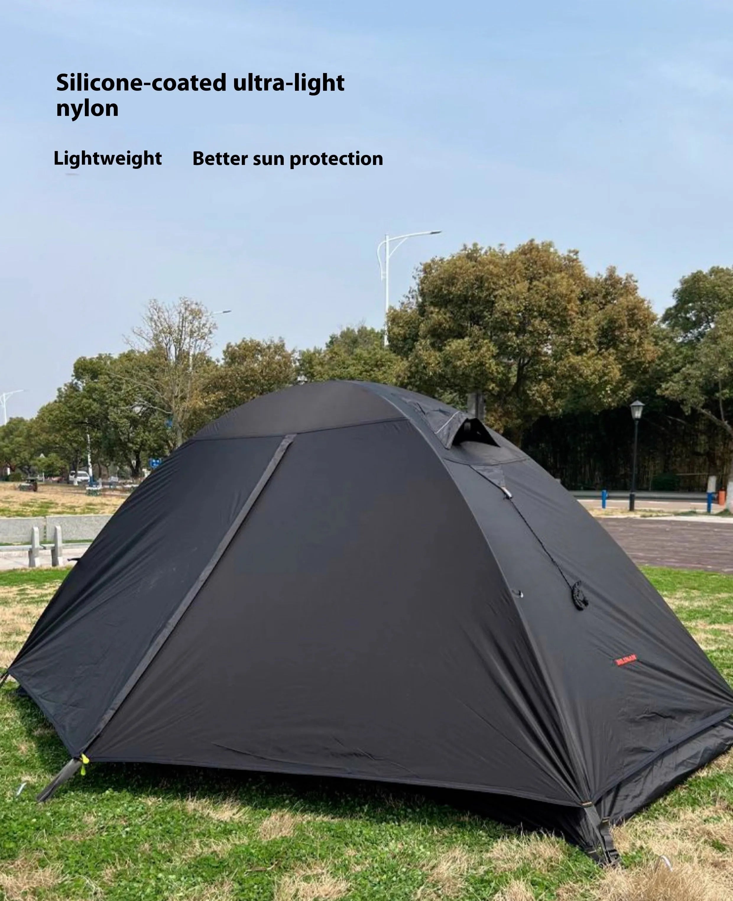 Single person tent with aluminium poles in red, black, or orange colour options, showing double-layer design