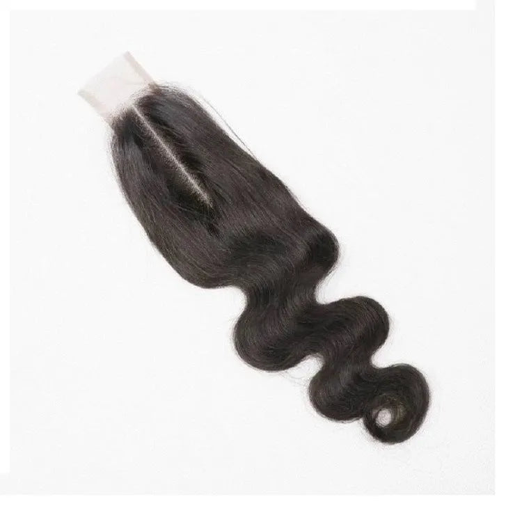 A straight, natural colour human hair wig for women displayed on a wig stand.