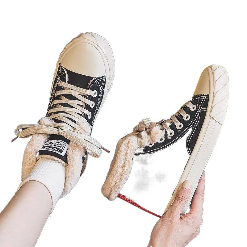 Women's black canvas high top trainers with animal print, cotton lining, buckle fastening and flat rubber sole, sizes 35-40