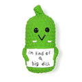 Green pickle-shaped squeaky dog chew toy with textured surface for teething puppies
