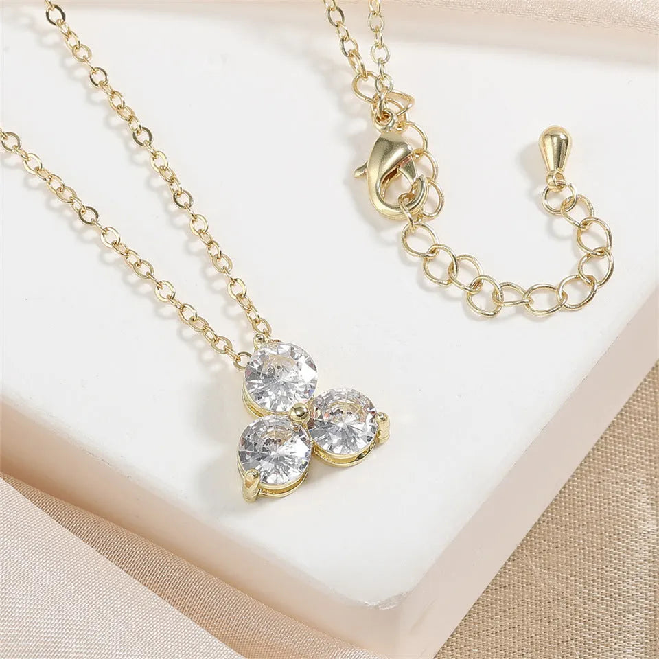 Tassel long necklace with electroplated copper water wave chain and round alloy pendant