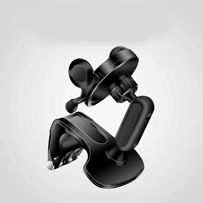 Black multifunctional car phone holder clipped onto a car sun visor, holding a smartphone.