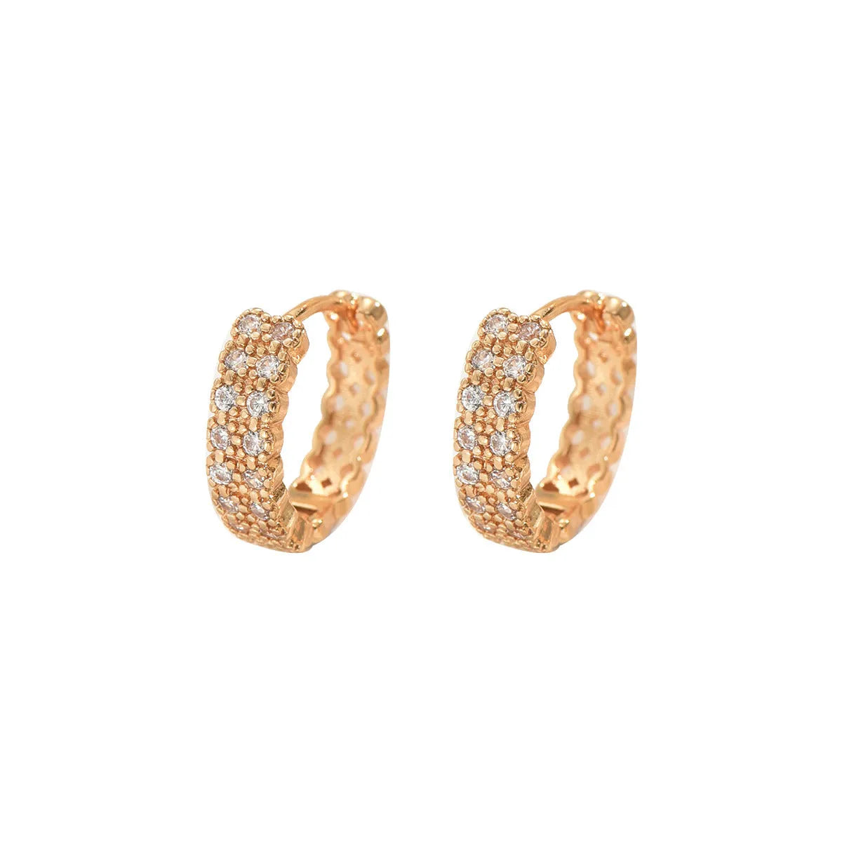 Geometric copper ear studs with round, dot, and ring pattern elements in colour DE20288