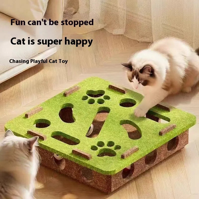 Green brown felt cube cat scratching toy with a square hole in the centre panel.