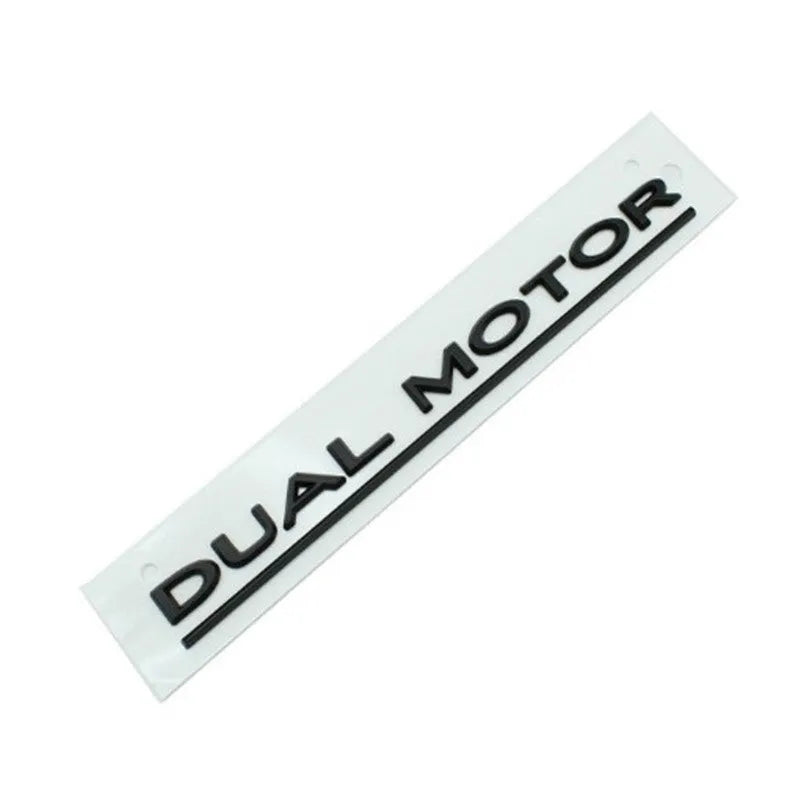 Black and red ABS plastic Double Motor performance badge sticker for Tesla Model 3 bumper.