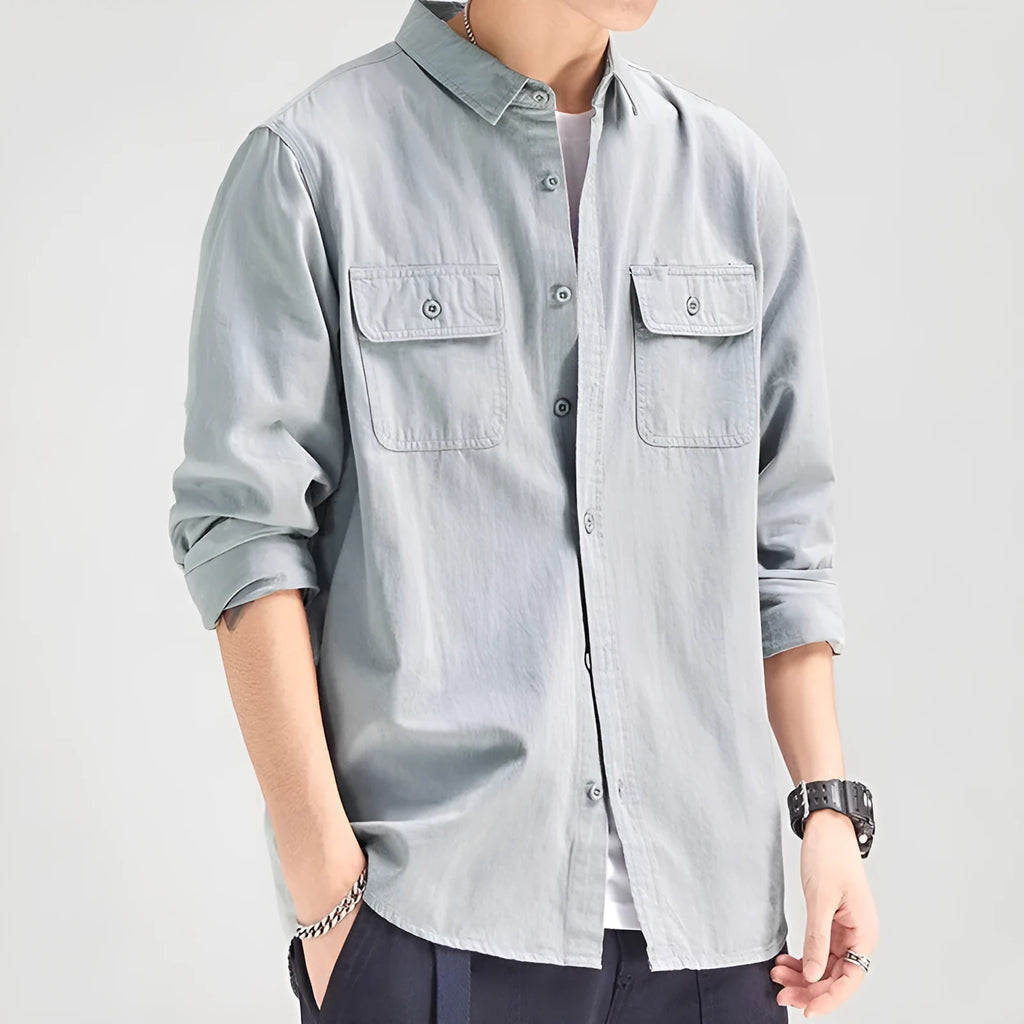 Men's light grey loose fit long sleeve overalls shirt with cardigan style on a hanger