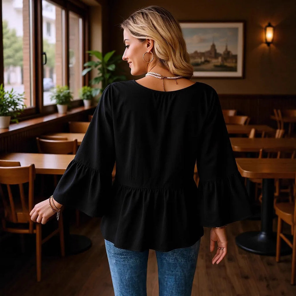 Women's black solid colour casual shirt with three-quarter flared sleeves and pleated detail, sizes S to 2XL.