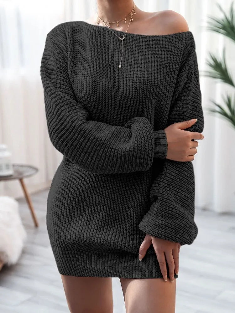 Women's off-the-shoulder knitted dress with full lantern sleeves in a solid colour.