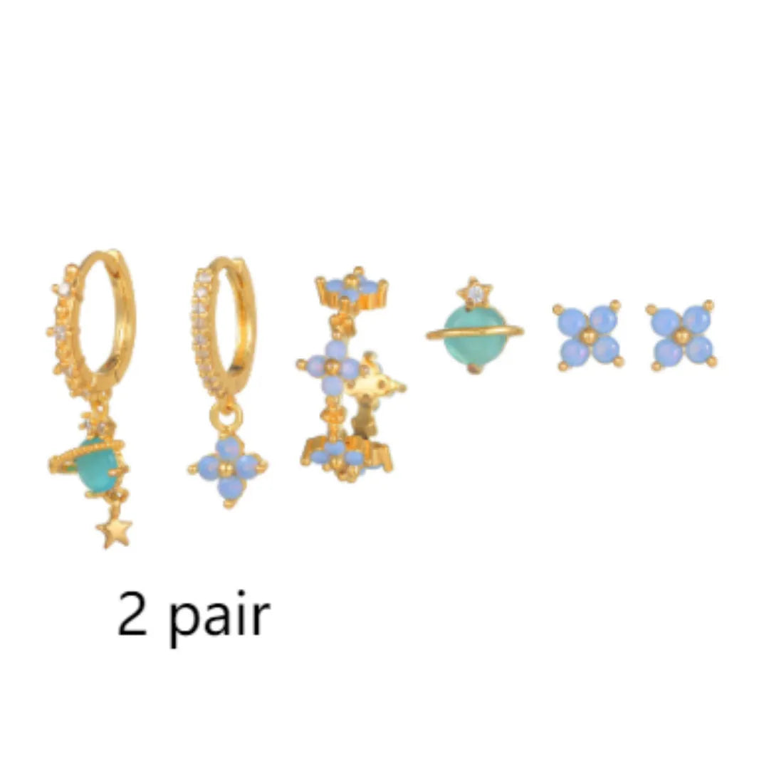 Gold and silver flower-shaped ear studs with zircon mosaic accents in Japanese Korean style