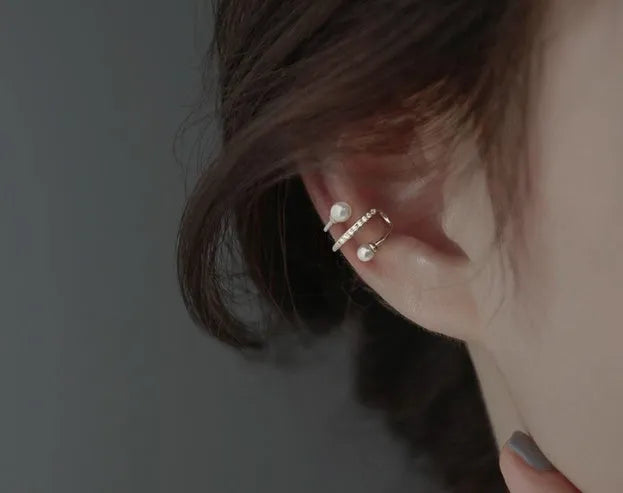 Silver plated pearl ear clips for unpierced ears, shown as a gold or silver pair in Japanese Korean style.