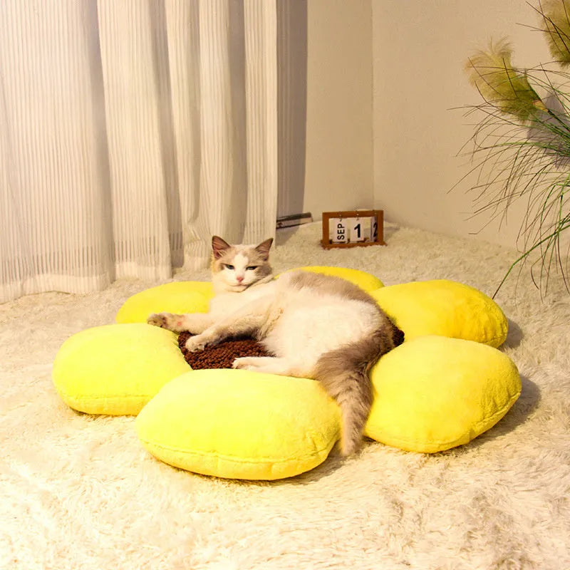 Large round plush cat bed with raised sides in blue or yellow colour