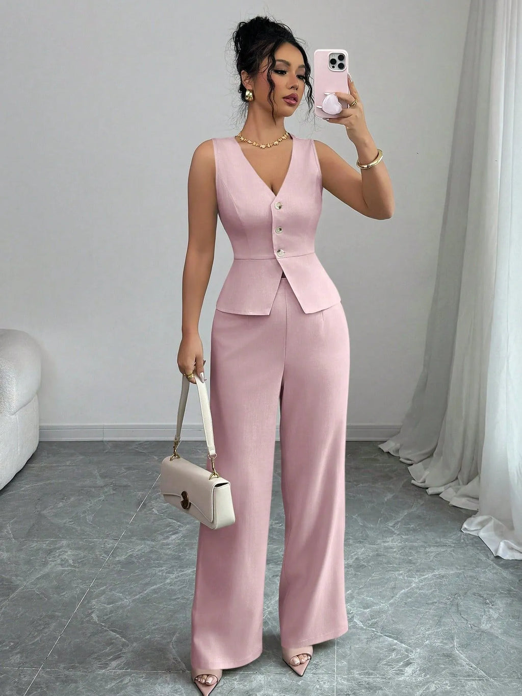Women's sleeveless vest and high-waist trousers two-piece set in solid colour polyester fabric.