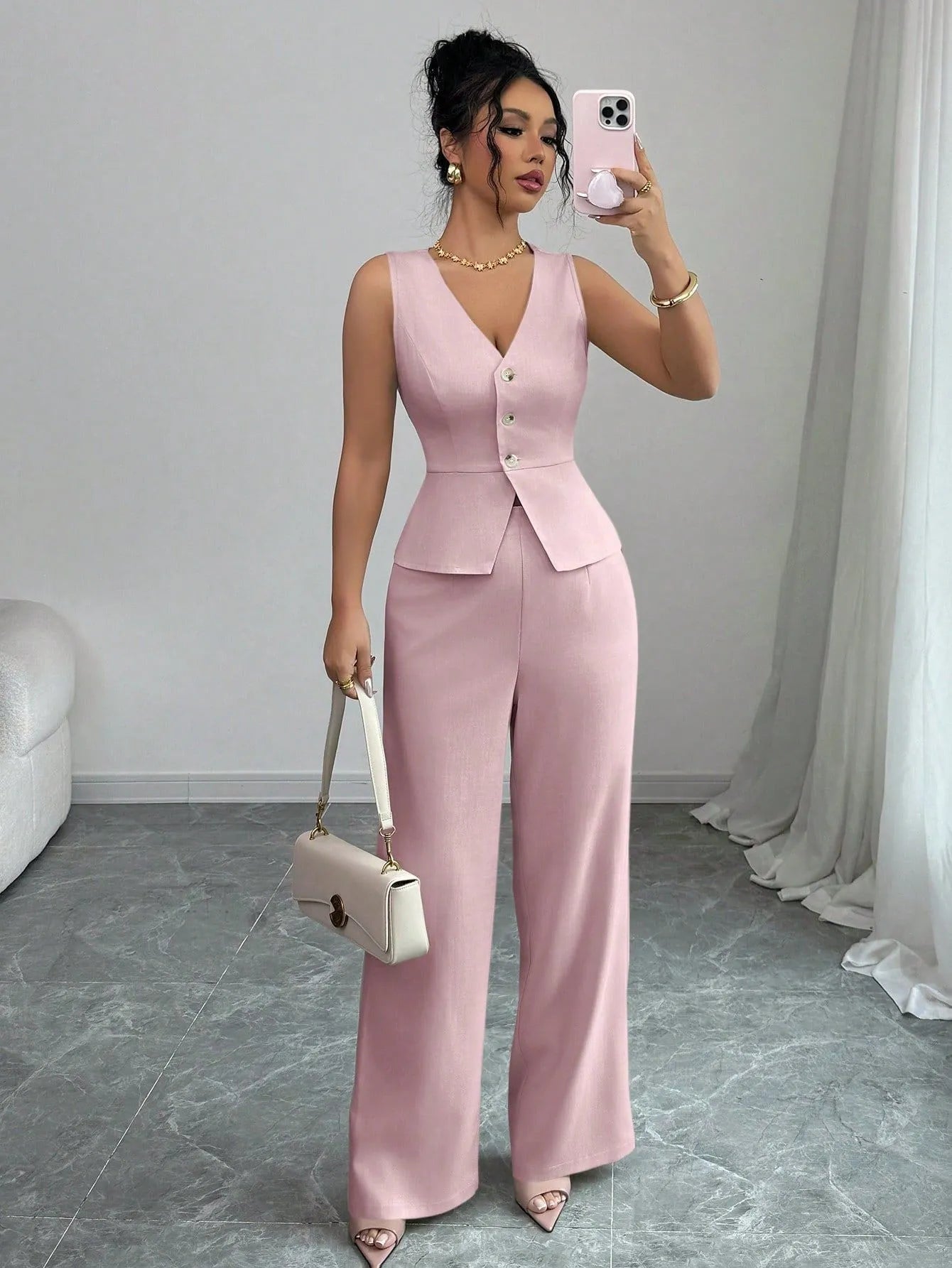 Women's sleeveless vest and high-waist trousers two-piece set in solid colour polyester fabric.