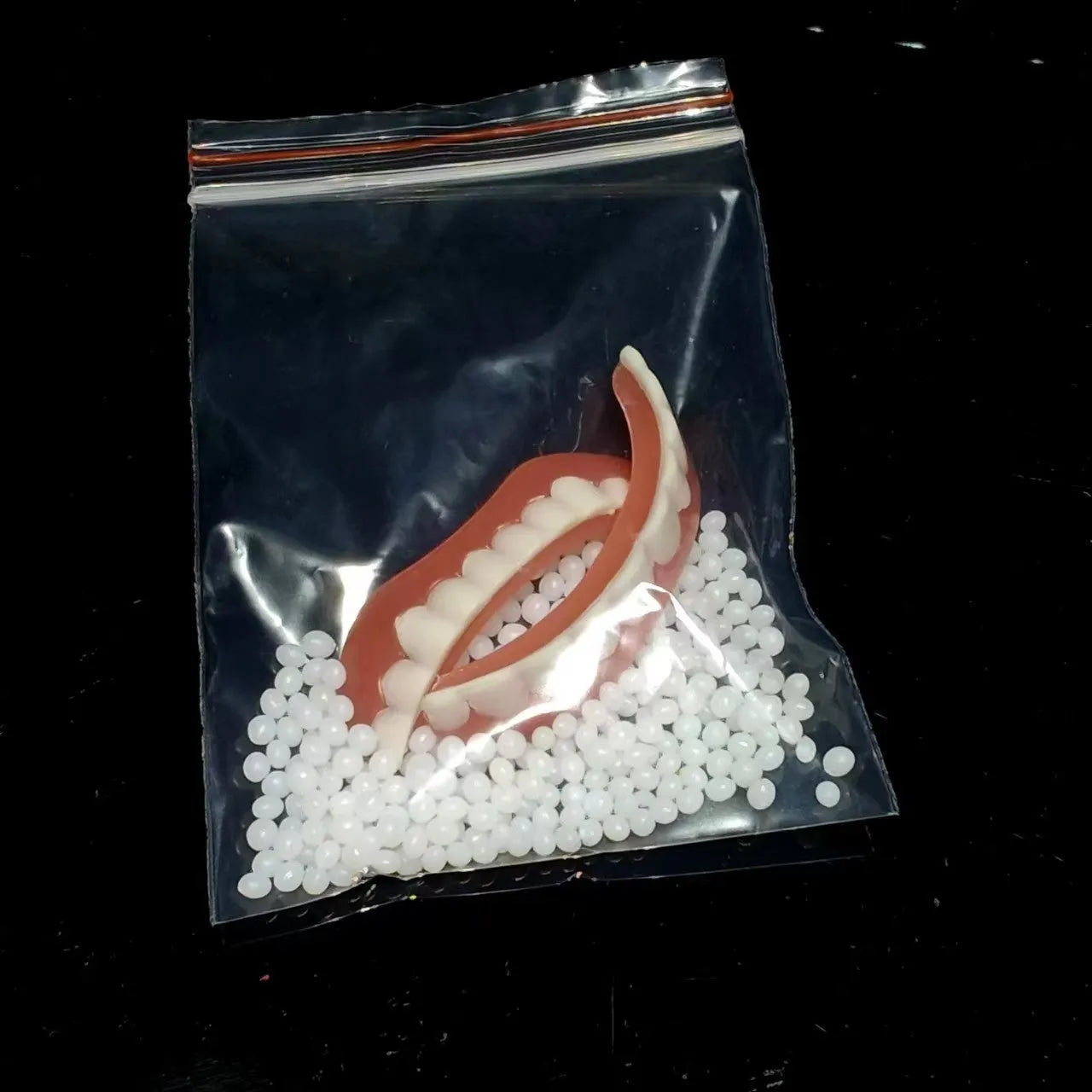 Silicone denture tooth socket teaching model with upper and lower teeth in colour box packaging