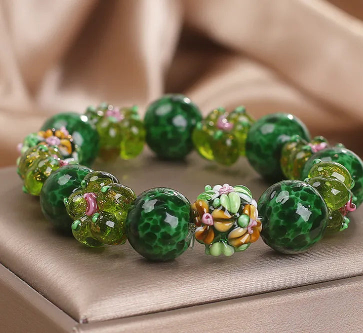 Chinese ancient flower glazed bracelet for women, green electroplated finish with floral charm