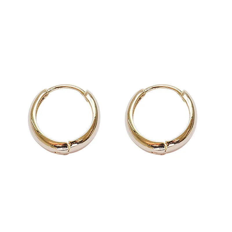 Women's geometric water drop earrings with copper construction and electroplated gold or silver finish