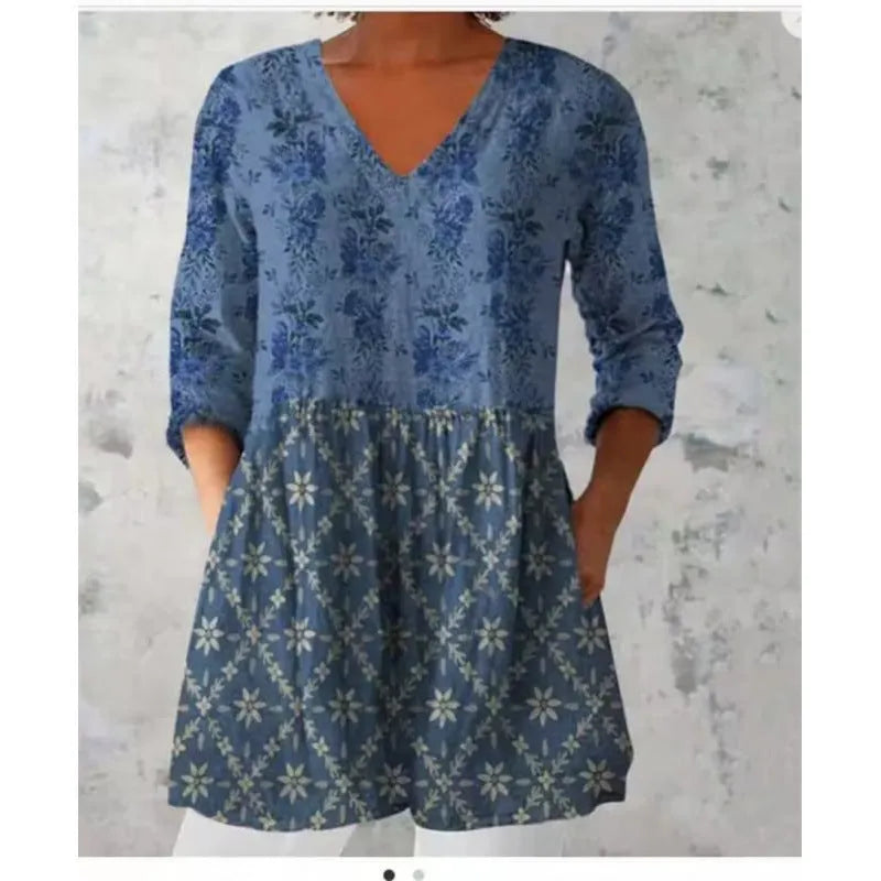 Women's printed loose wave dress with 3/4 sleeves and wide waist in colourful pattern