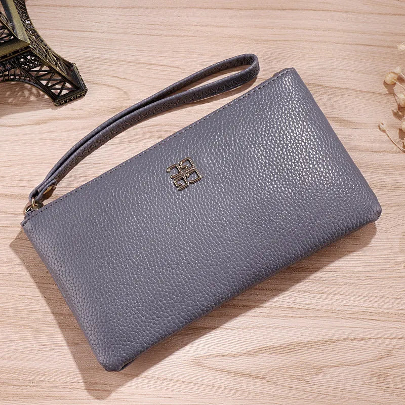 Large 55-inch long PU leather phone wallet handbag with zip closure in solid colour